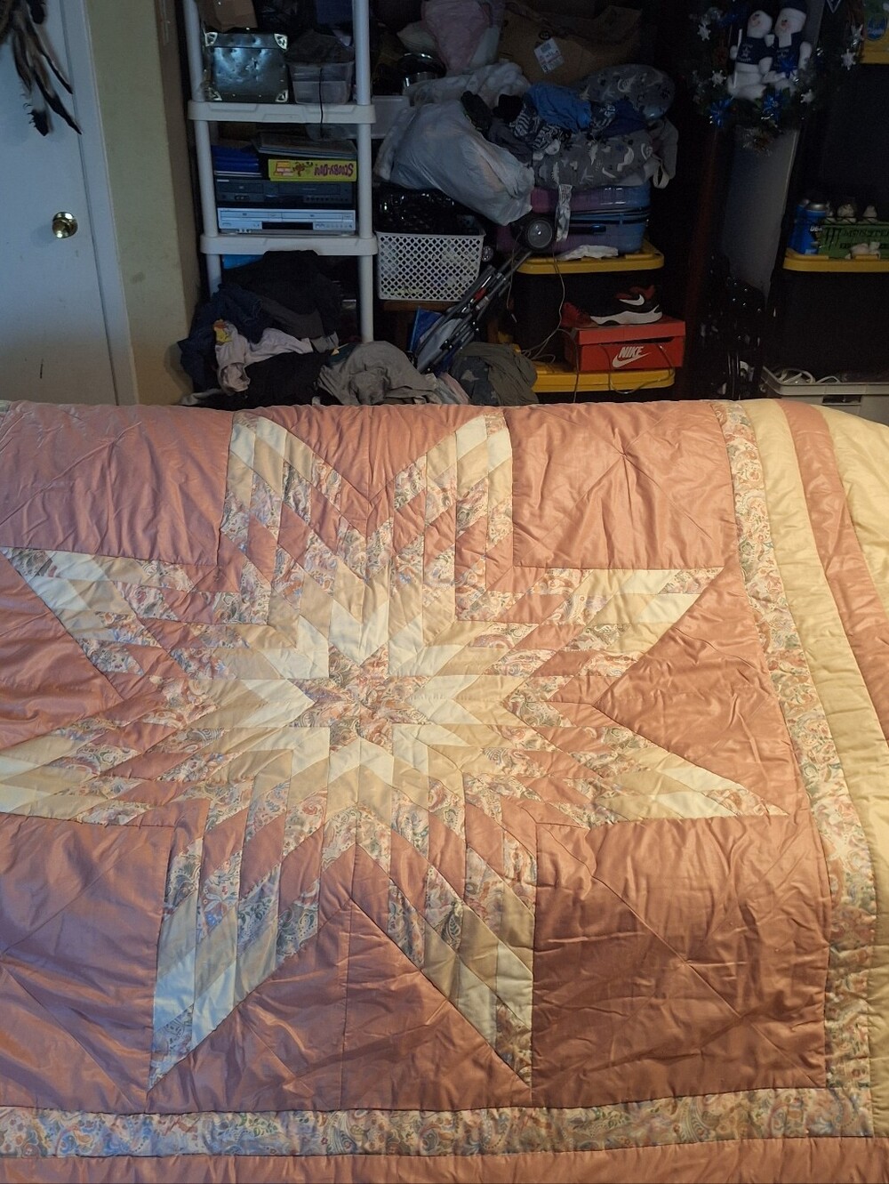handmade queen size quilt in pink and white with 2 pillow shams and 2 small pill